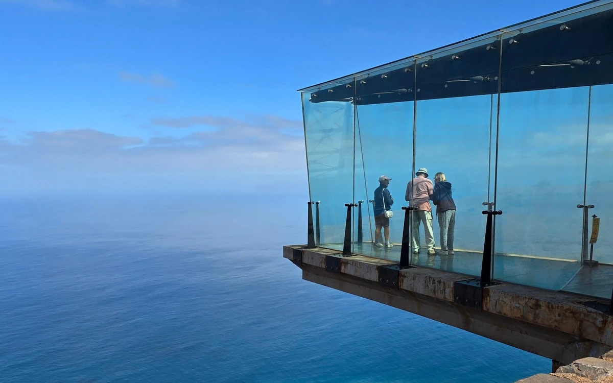 A glass-walled viewpoint hanging over the sea on La Gomera
